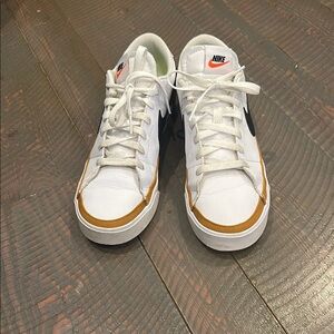 Nike Women’s White and Gold Sneakers